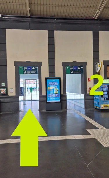 Exit on your left towards the taxi rank